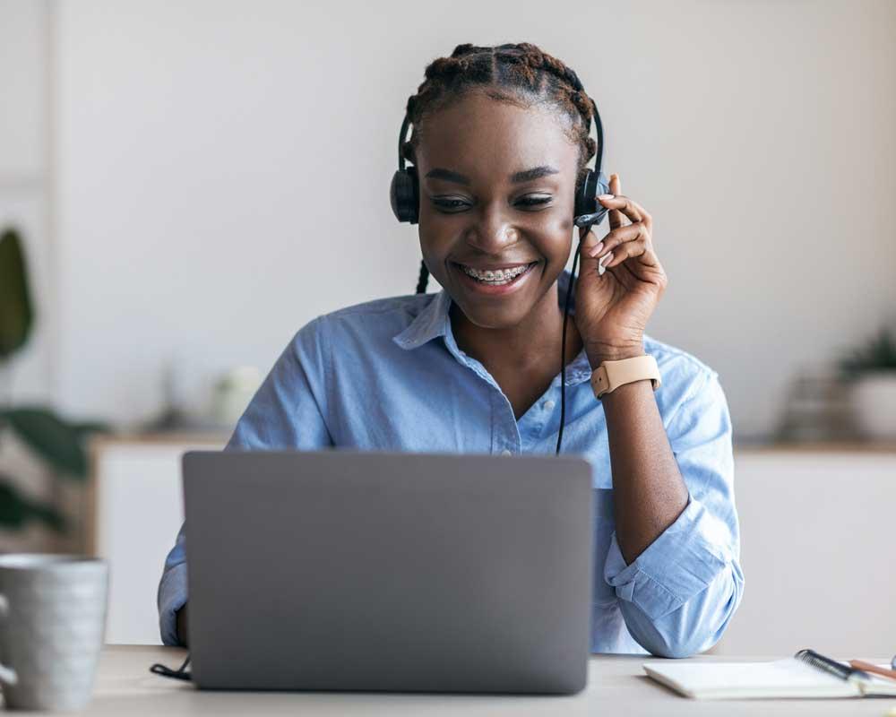 Estates assistant talking to a tenant on the phone