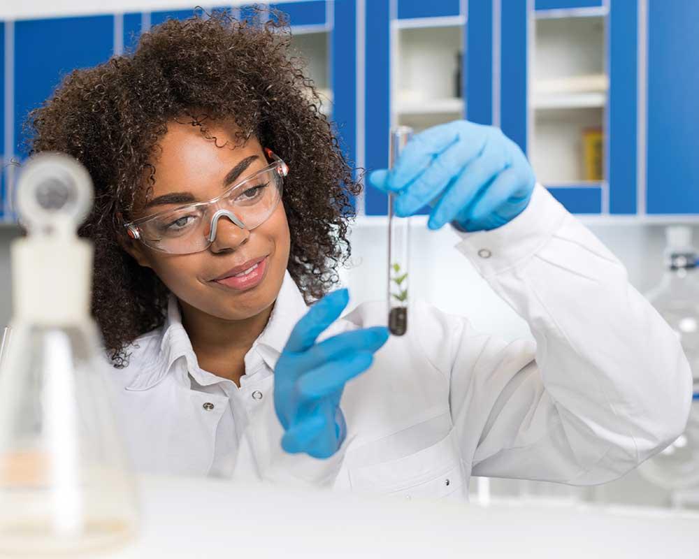 Lab technician holding a test tube
