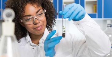 Lab technician holding a test tube