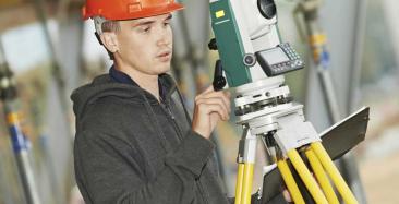 Civil engineer with theodolite