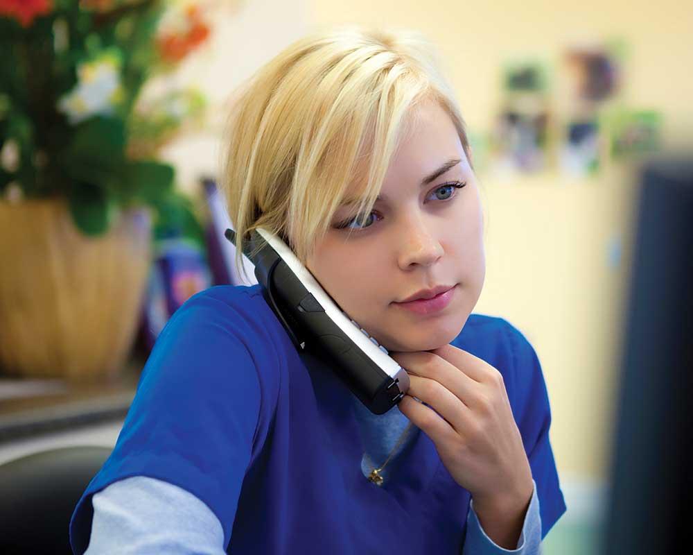 Care navigator talking to a patient on the phone