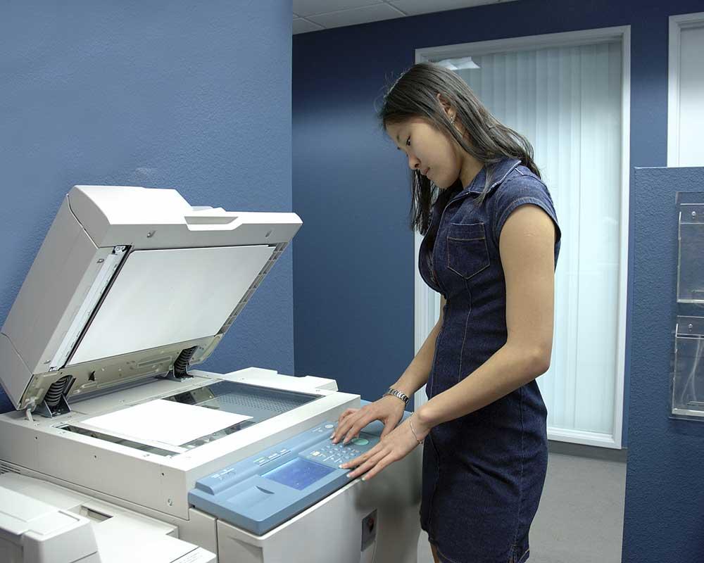 Office worker scanning documents