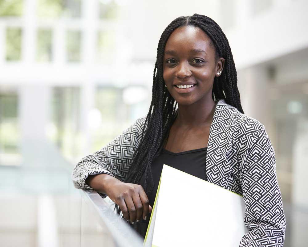 Customer service officer carrying some paperwork